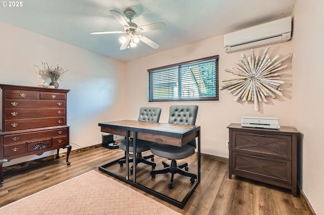 190 SE Shafford St, Estacada, OR 97023 - office space with a wall unit AC, a ceiling fan, and wood finished floors