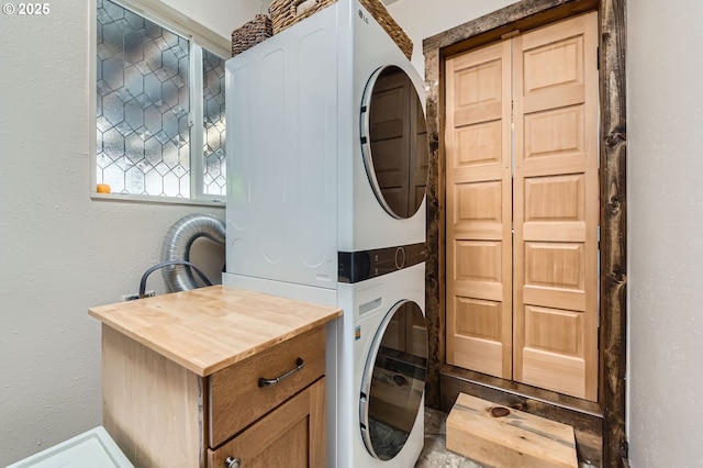 190 SE Shafford St, Estacada, OR 97023 - washroom with estacked washer and dryer and cabinet space