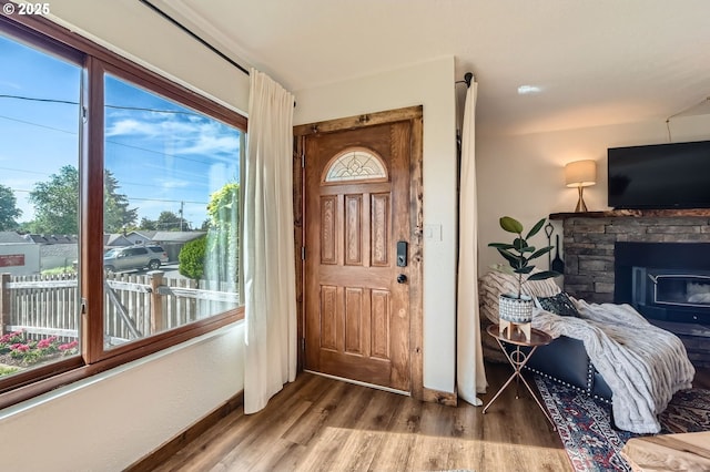190 SE Shafford St, Estacada, OR 97023 - foyer entrance with wood finished floors and a fireplace