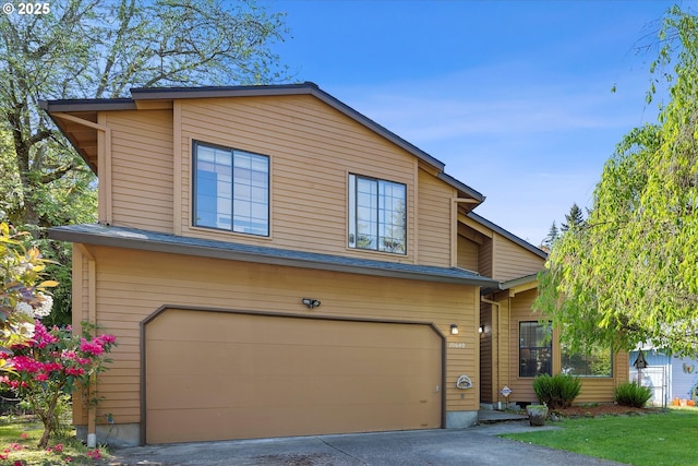 view of front of home with a garage, asphalt driveway, and a front lawn