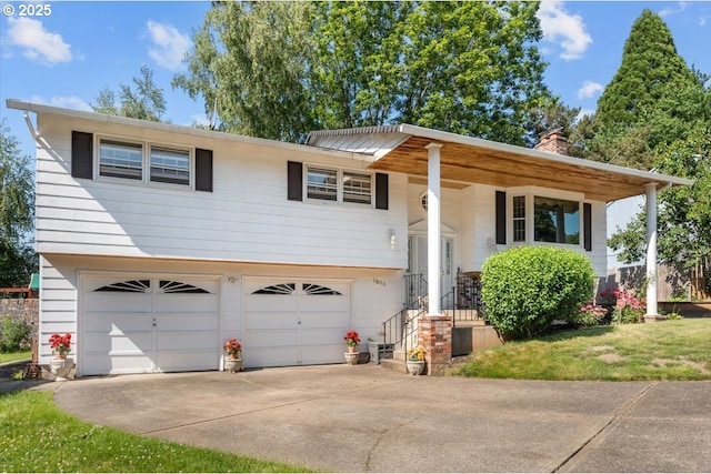 1845 SW 18th Ct, Gresham, OR 97080 - split foyer home with a garage, a chimney, concrete driveway, and a front yard