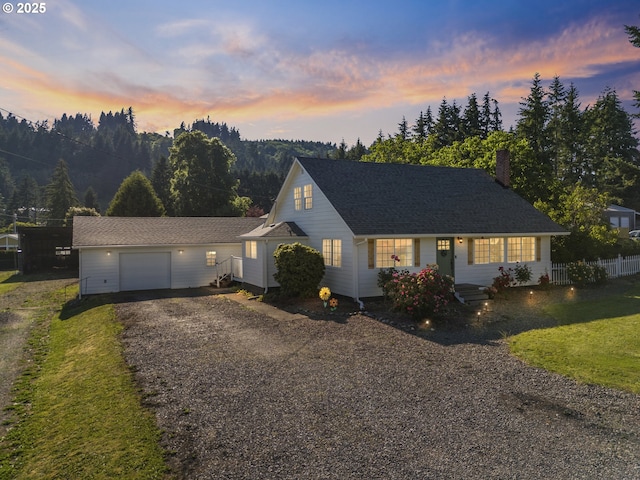 12275 SE School Ave, Boring, OR 97009 - view of front of property featuring an outdoor structure, gravel driveway, a chimney, and an attached garage