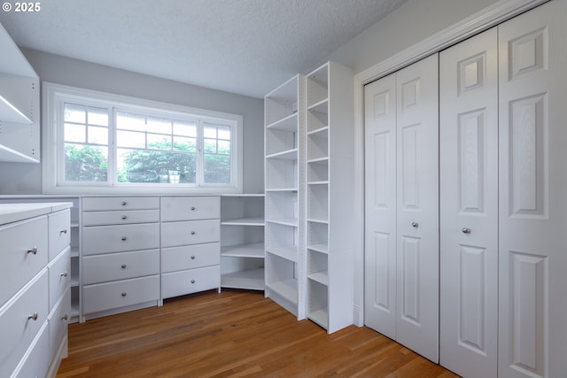 7105 Mississippi Dr, Vancouver, WA 98664 - walk in closet featuring wood finished floors