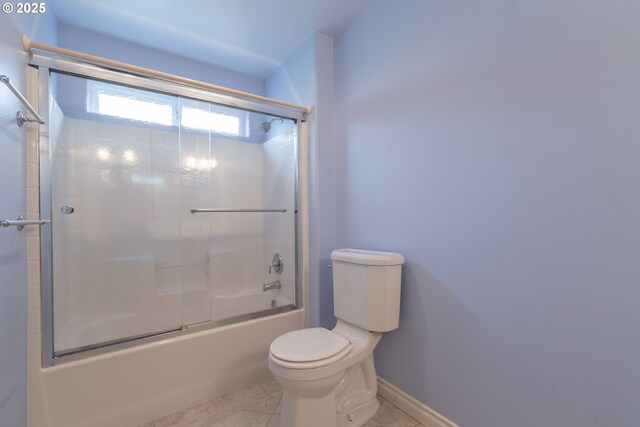 7105 Mississippi Dr, Vancouver, WA 98664 - bathroom with toilet, enclosed tub / shower combo, and baseboards