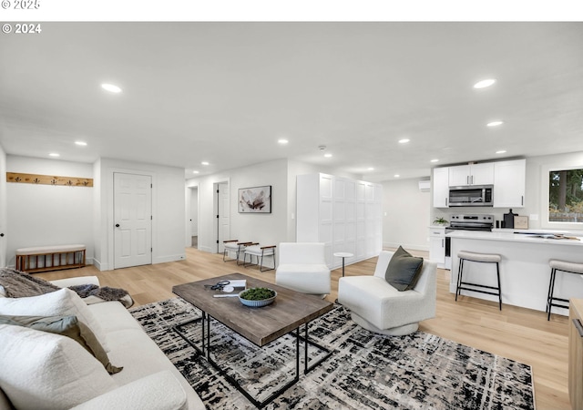 living room with light hardwood / wood-style floors