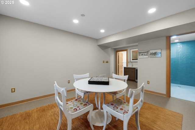 1209 N Prom, Seaside, OR 97138 - dining space featuring recessed lighting, baseboards, and carpet floors