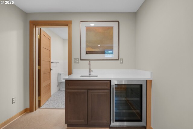 1209 N Prom, Seaside, OR 97138 - bar area with beverage cooler, a sink, and light colored carpet
