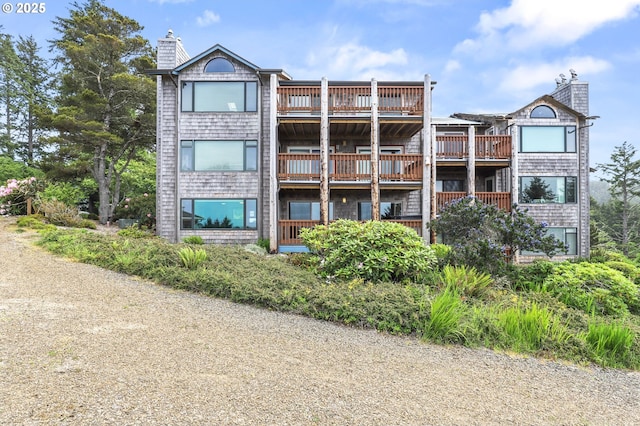 2801 Willows Rd Unit 1, Seaview, WA 98644 - rear view of property with a chimney