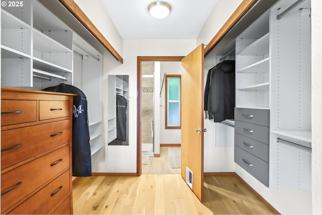 2801 Willows Rd Unit 1, Seaview, WA 98644 - walk in closet with light wood-style floors