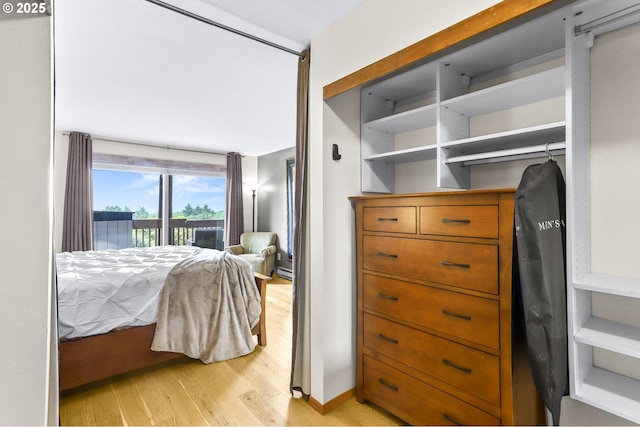 2801 Willows Rd Unit 1, Seaview, WA 98644 - bedroom featuring access to outside and light wood finished floors