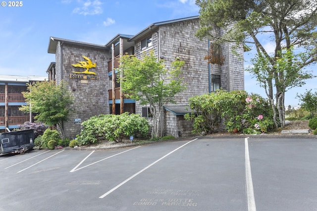2801 Willows Rd Unit 1, Seaview, WA 98644 - view of building exterior featuring uncovered parking