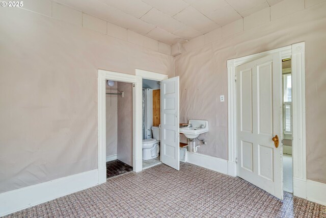 644 4th St, Myrtle Point, OR 97458 - unfurnished bedroom with baseboards