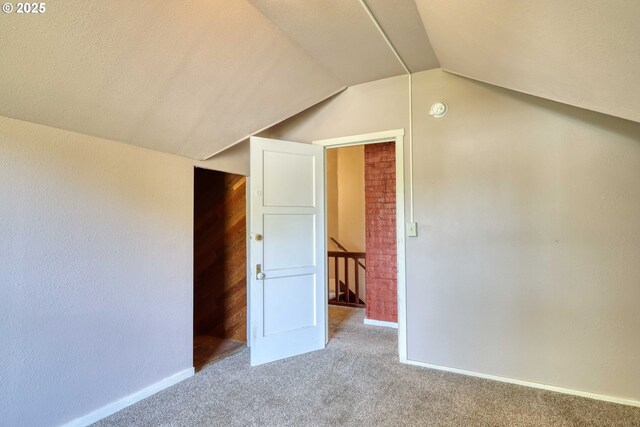 644 4th St, Myrtle Point, OR 97458 - additional living space featuring carpet flooring, baseboards, and lofted ceiling