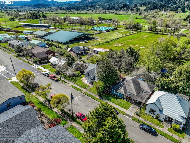 644 4th St, Myrtle Point, OR 97458 - drone / aerial view featuring a mountain view