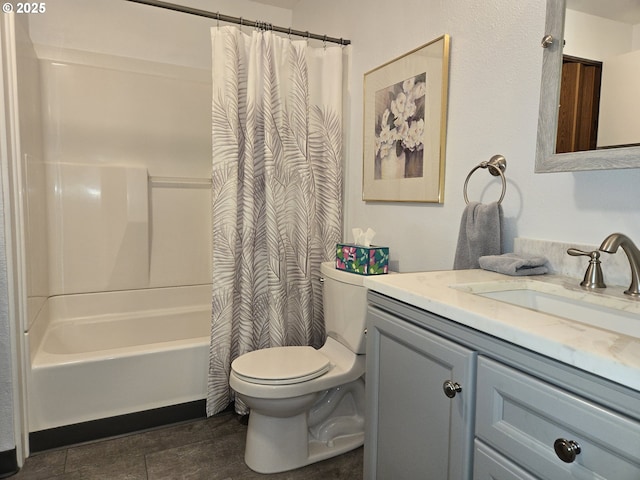 bathroom featuring tile patterned floors, vanity, toilet, and shower / bath combo with shower curtain