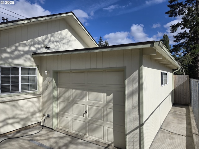 garage with fence