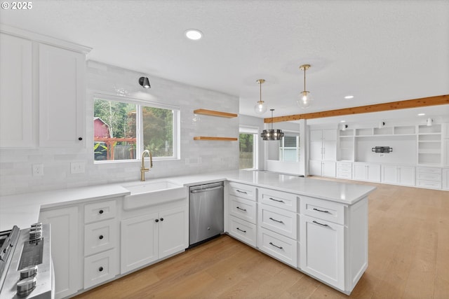 19338 Inishbride Ct, Oregon City, OR 97045 - kitchen featuring stainless steel appliances, a peninsula, recessed lighting, light wood-type flooring, and white cabinetry