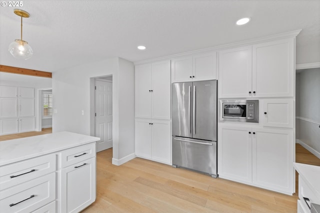 19338 Inishbride Ct, Oregon City, OR 97045 - kitchen featuring appliances with stainless steel finishes, light wood-style flooring, white cabinetry, hanging light fixtures, and recessed lighting
