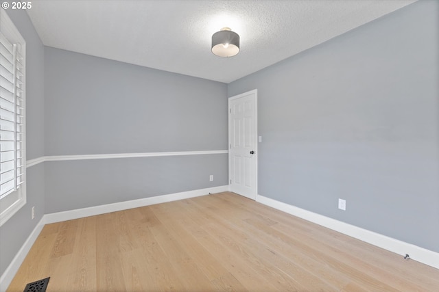 19338 Inishbride Ct, Oregon City, OR 97045 - empty room with wood finished floors and baseboards