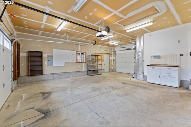 19338 Inishbride Ct, Oregon City, OR 97045 - garage featuring a garage door opener and electric panel