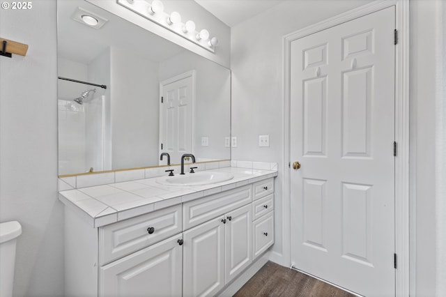 19338 Inishbride Ct, Oregon City, OR 97045 - bathroom with vanity, wood finished floors, and a shower