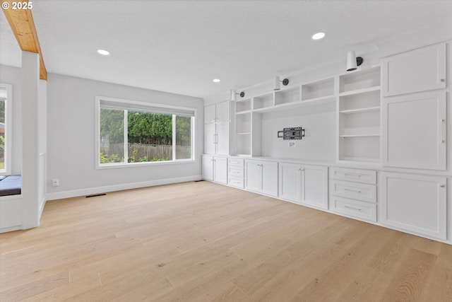 19338 Inishbride Ct, Oregon City, OR 97045 - unfurnished living room with light wood-style floors and recessed lighting