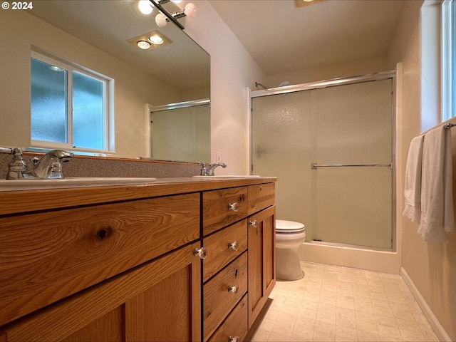 2175 23rd St, Florence, OR 97439 - bathroom with a stall shower, double vanity, toilet, and a sink