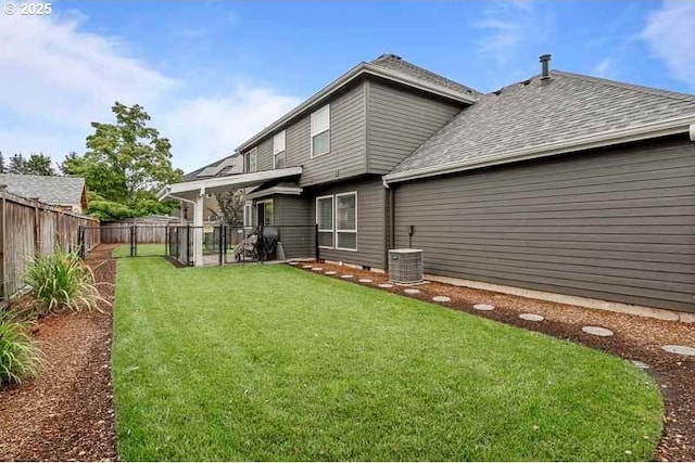 715 Shadowwood Loop, Keizer, OR 97303 - back of property featuring a fenced backyard and roof with shingles