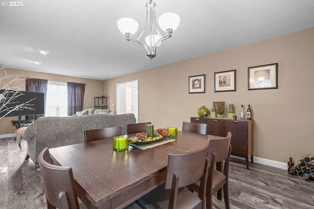 715 Shadowwood Loop, Keizer, OR 97303 - dining area featuring wood finished floors and a chandelier