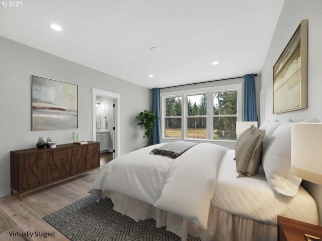 37330 Labiske Ln, Astoria, OR 97103 - bedroom with light wood-style floors, recessed lighting, and connected bathroom