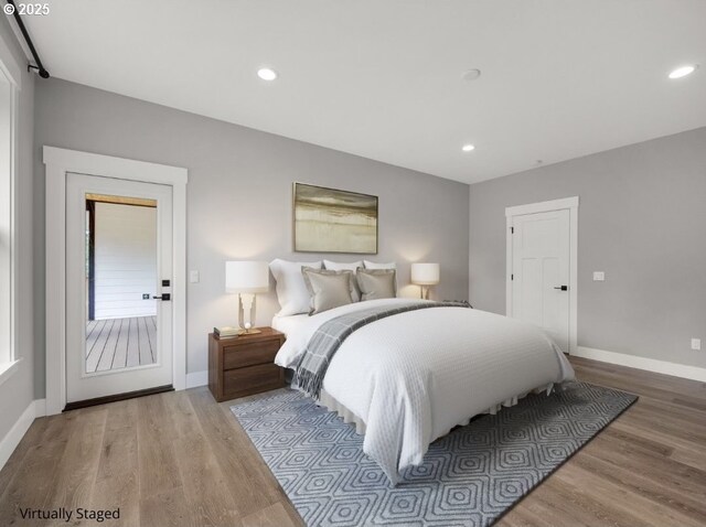 37330 Labiske Ln, Astoria, OR 97103 - bedroom with wood finished floors, baseboards, and recessed lighting