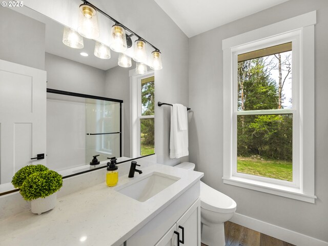 37330 Labiske Ln, Astoria, OR 97103 - bathroom featuring baseboards, plenty of natural light, vanity, and an enclosed shower