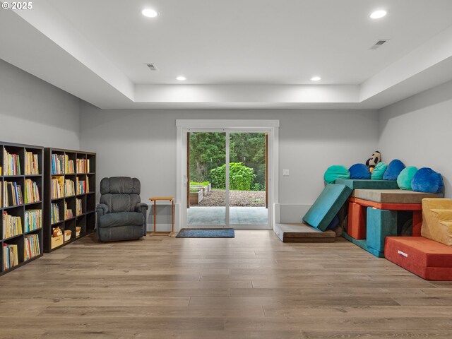 37330 Labiske Ln, Astoria, OR 97103 - living area featuring wood finished floors, recessed lighting, and a raised ceiling