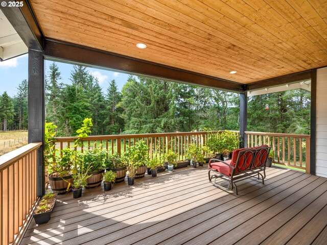 37330 Labiske Ln, Astoria, OR 97103 - wooden deck featuring view of wooded area