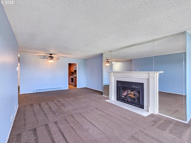 213 Oswego, Lake Oswego, OR 97035 - unfurnished living room featuring baseboard heating, a ceiling fan, a tile fireplace, carpet flooring, and a textured ceiling
