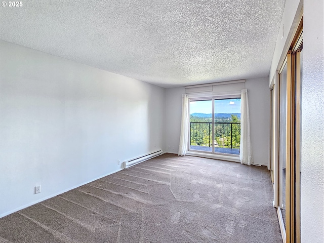 213 Oswego, Lake Oswego, OR 97035 - spare room with a baseboard radiator, carpet flooring, and a textured ceiling