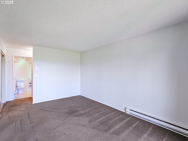 213 Oswego, Lake Oswego, OR 97035 - carpeted spare room featuring a baseboard radiator and a textured ceiling