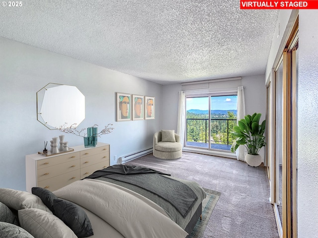 213 Oswego, Lake Oswego, OR 97035 - carpeted bedroom featuring baseboard heating and a textured ceiling