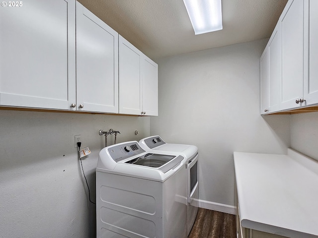 213 Oswego, Lake Oswego, OR 97035 - washroom with cabinet space, washing machine and clothes dryer, and dark wood-style flooring