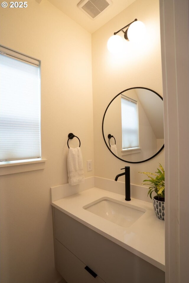 12071 SE Oak St, Portland, OR 97216 - bathroom with visible vents and vanity