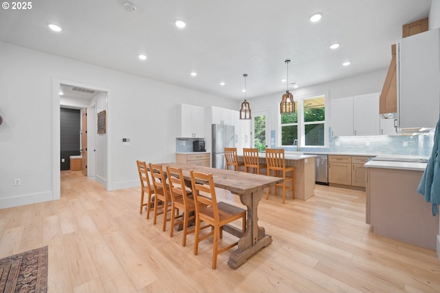 305 Fir Rd, Ariel, WA 98603 - dining space featuring light wood-type flooring, recessed lighting, and baseboards