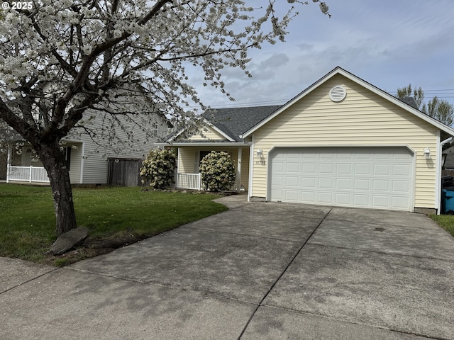 single story home with a front lawn, a shingled roof, a garage, and concrete driveway