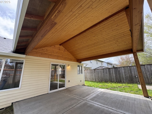 view of patio / terrace featuring fence