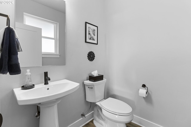 bathroom with sink and toilet