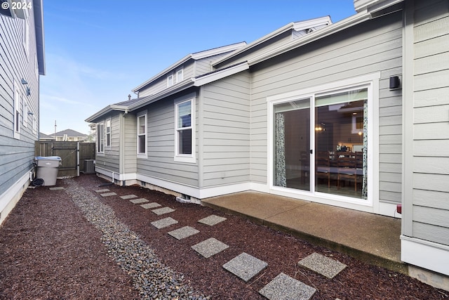 view of side of property featuring central AC unit