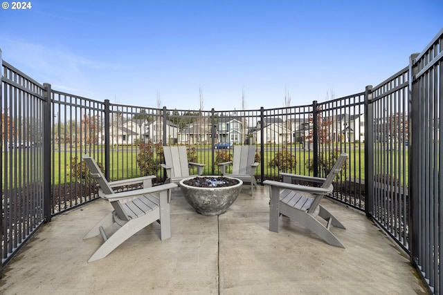 view of patio with an outdoor fire pit