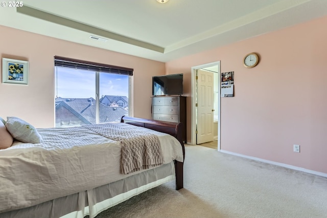 carpeted bedroom with access to outside and baseboards