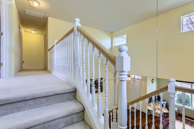stairs featuring healthy amount of natural light