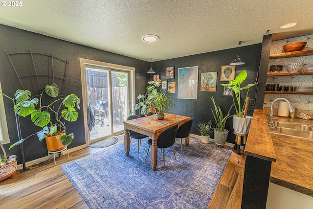 9511 NE 73rd St, Vancouver, WA 98662 - dining area featuring wood finished floors, a textured ceiling, and recessed lighting