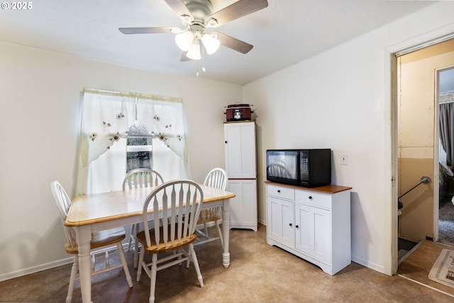 dining area featuring ceiling fan